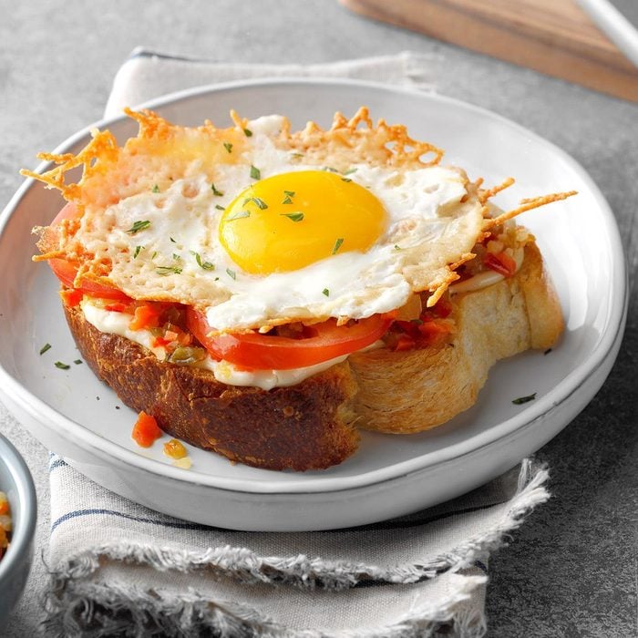 Open-faced frico egg sandwich