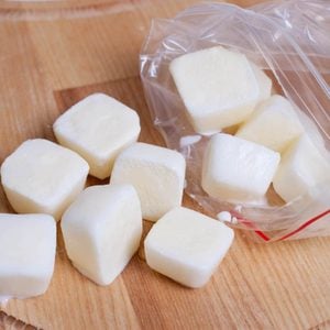 Frozen milk cubes stored in a plastic bag