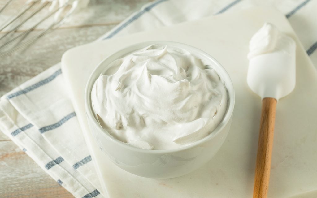 substitute for whipped topping Sweet Homemade Vanilla Whipped Cream in a Bowl