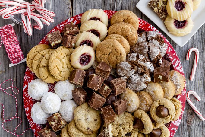 Holiday gift platter filled with homemade cookies and candies ready for gifting