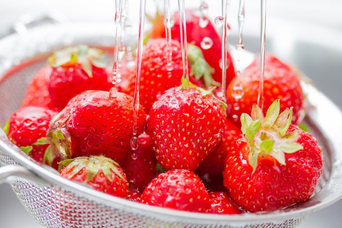 Strawberries rinsed with water; Shutterstock ID 205094437