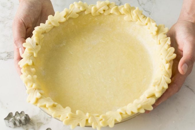 Method for how to decorate pie crust. Image of leaf crust trim.