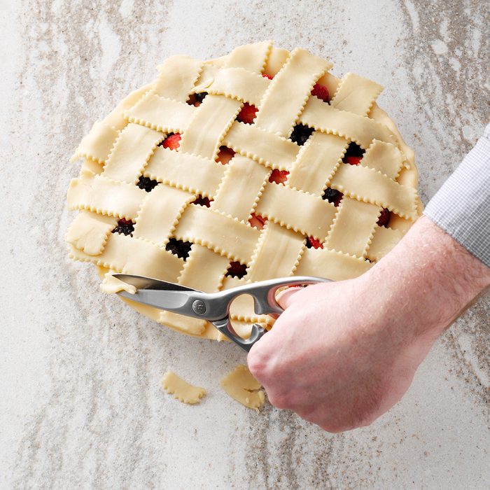 trimming the lattice on top of a pie
