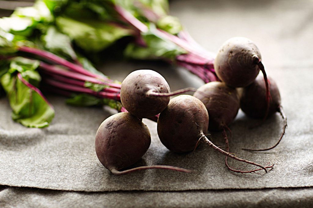 Beets on a kitchen table.
