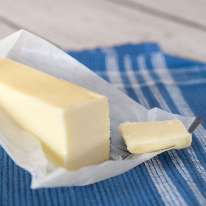 Stick of creamery butter in opened wrapper; Shutterstock ID 368432732; Job (TFH, TOH, RD, BNB, CWM, CM): Taste of Home
