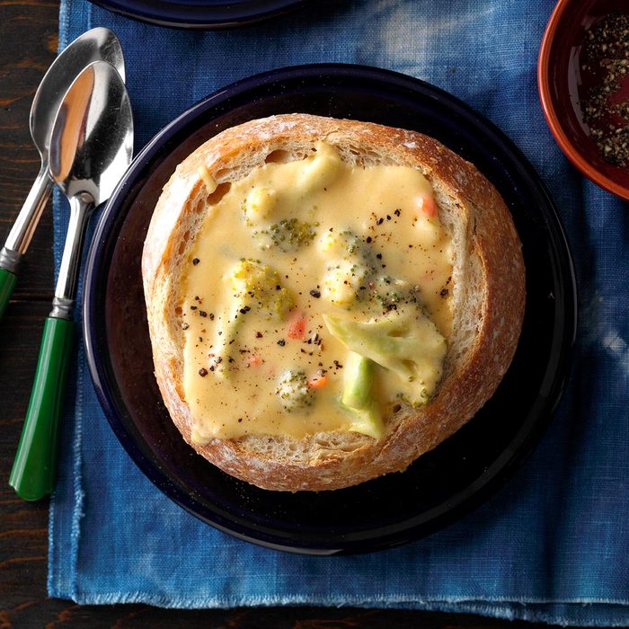 Cheesy broccoli soup in a bread bowl