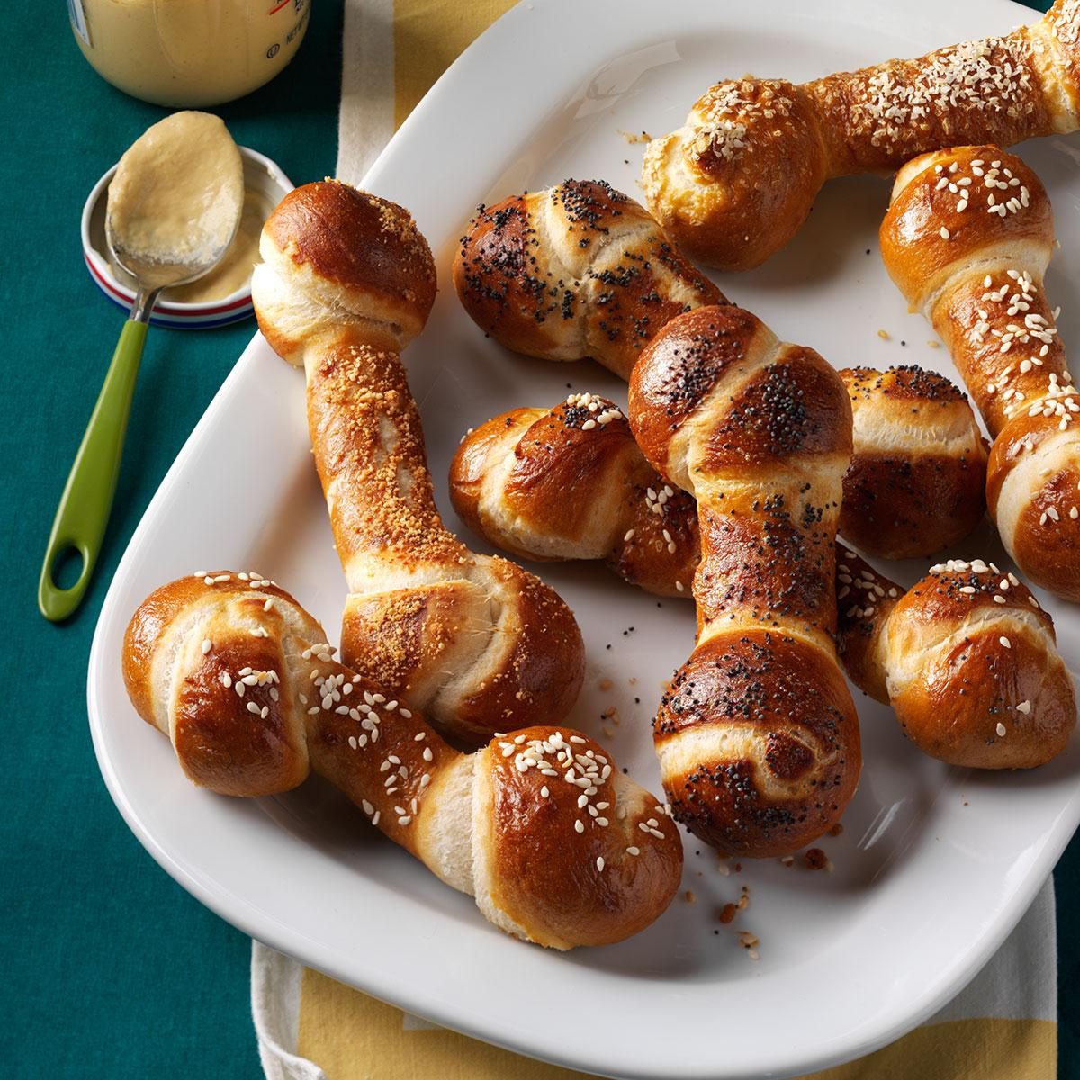 pretzels shaped like bones on a white dish
