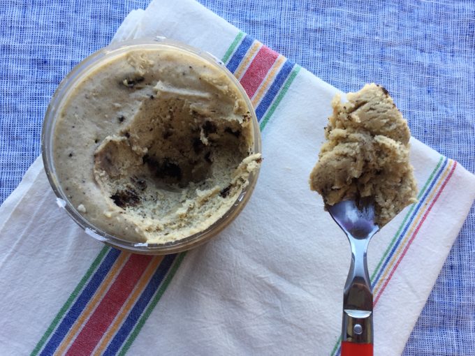 Spoon pulled out from Oreo's cookie dough