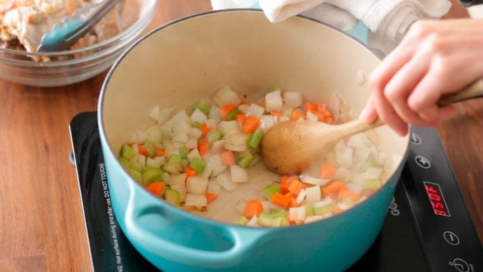 Diced vegetables in a stockpot