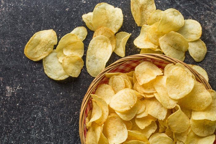 Potato chips in an over-filled bowl