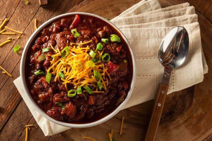Bowl of chili with cheese on top
