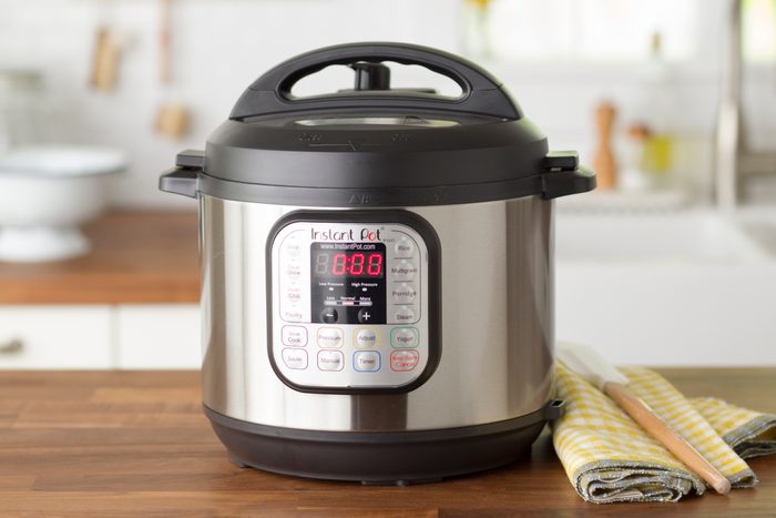 Instant pot on a wooden countertop