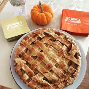 Friendsgiving pie at table.