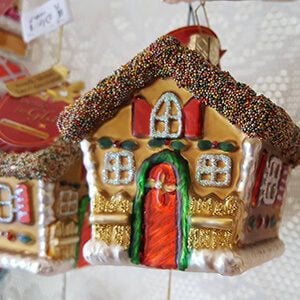 Close-up of two gingerbread house ornaments