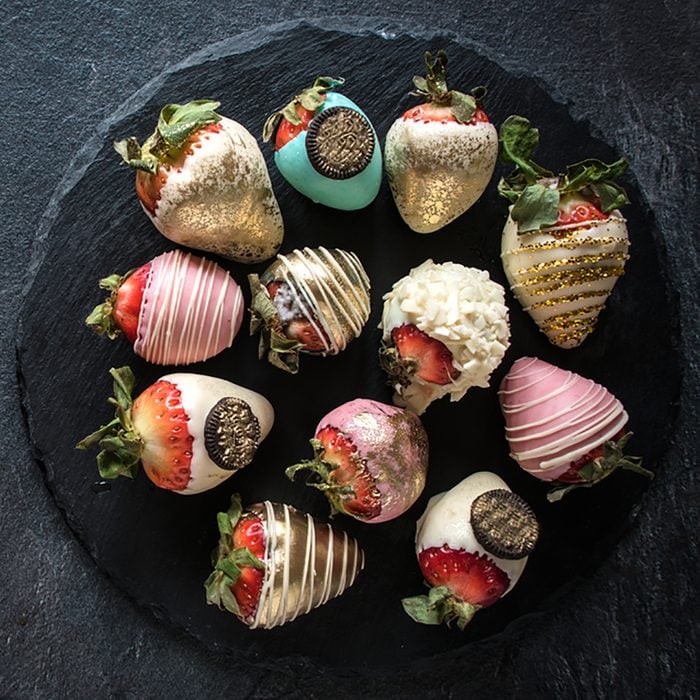 Sweet strawberries in chocolate served,blank space; Shutterstock ID 559916296
