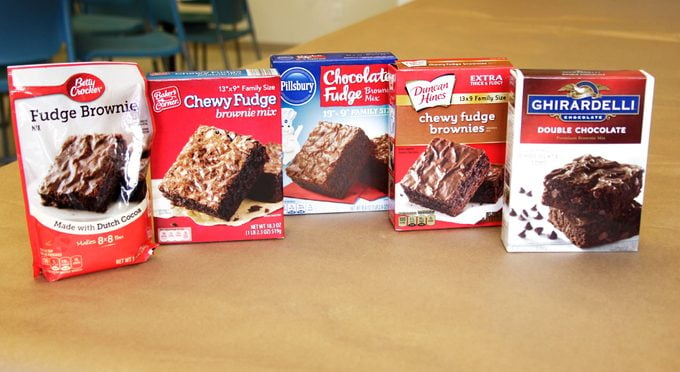 Line-up of different brands of brownie mix