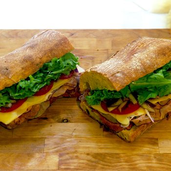 Cut in half sandwich on a cutting board