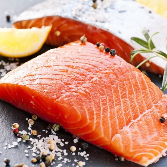 Fresh salmon with spices; Shutterstock ID 91610936