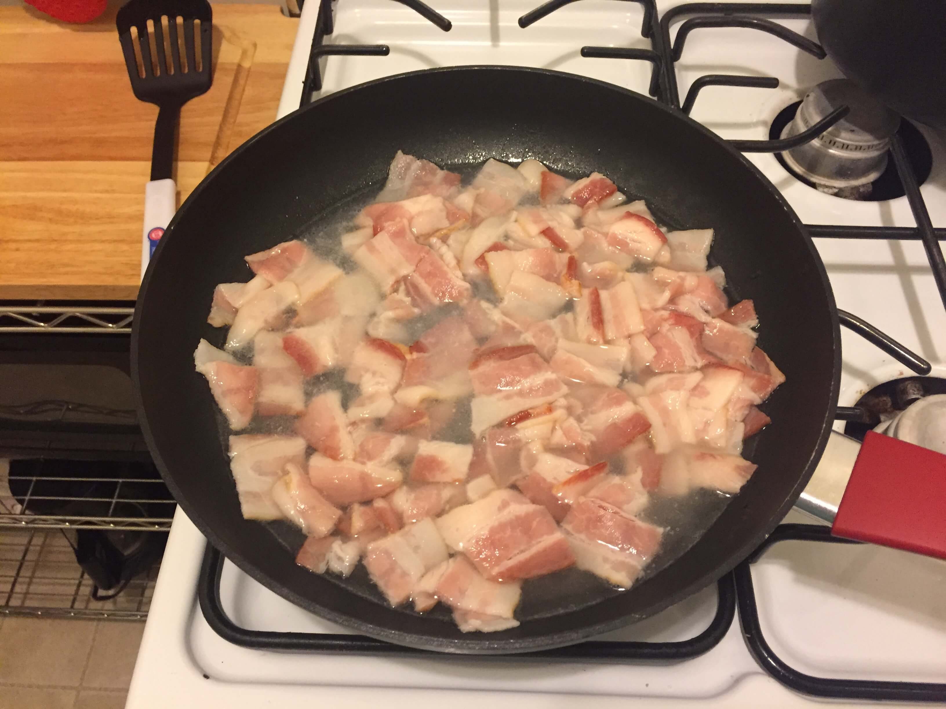 Bacon frying in a skillet