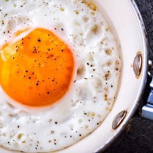 Egg cooking in a skillet