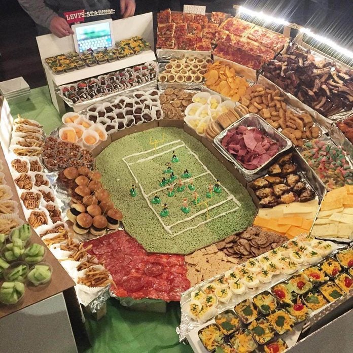 elaborate Super Bowl snack stadium with iPad scoreboard