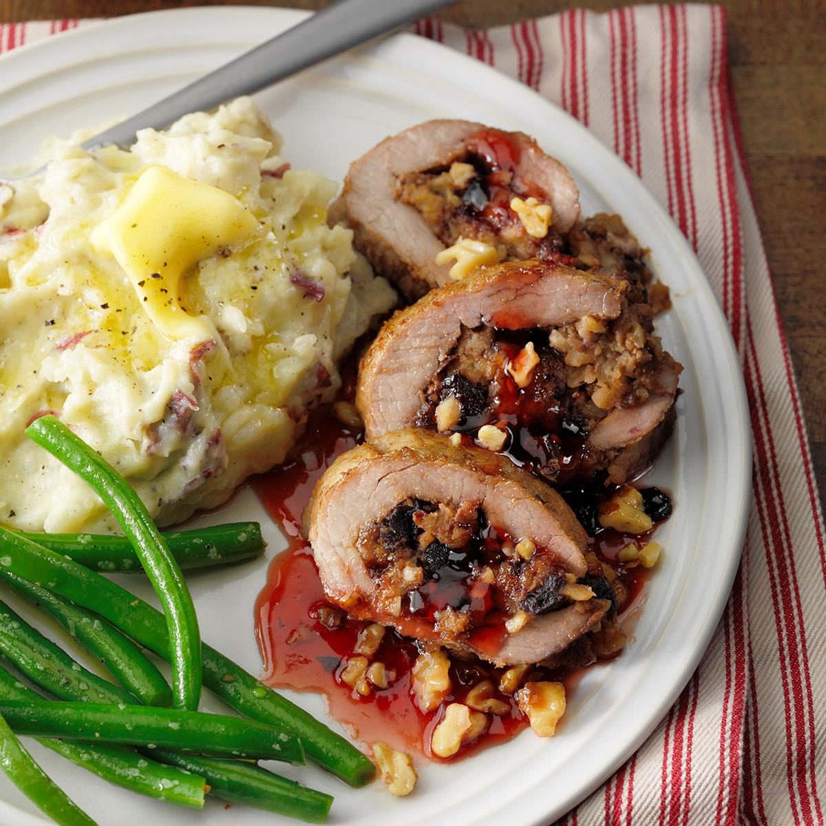 Apple and Walnut Stuffed Pork Tenderloin with Red Currant Sauce