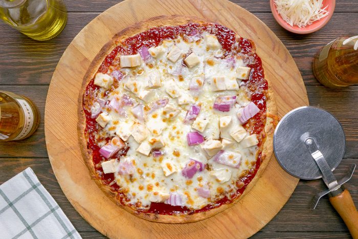 Barbecue Chicken Pizza on a Wooden Pizza Plate