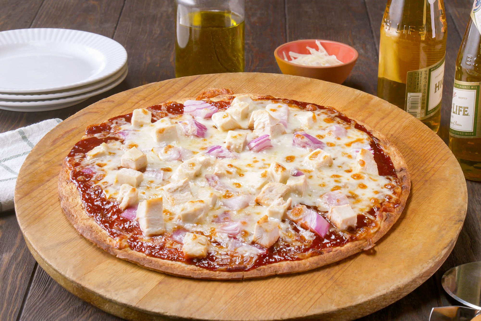 Barbecue Chicken Pizza on a Wooden Pizza Plate