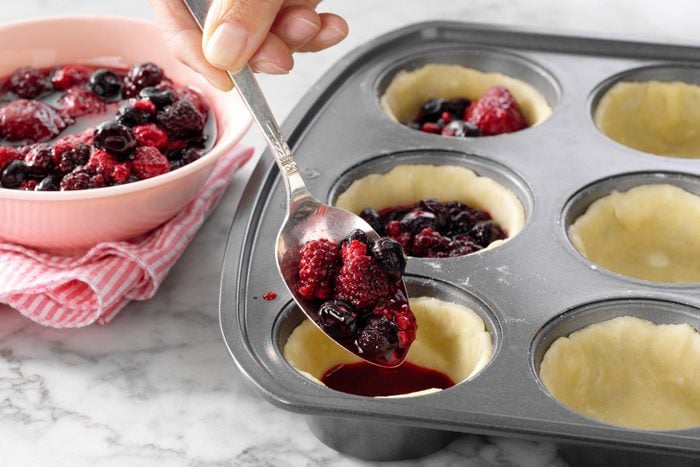 A Spoonful of Berries in a Muffin Tin