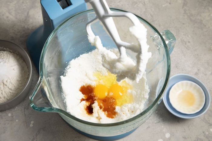 Eggs and vanilla in a hand mixer
