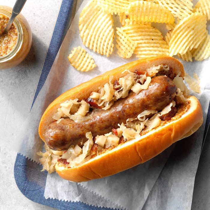 Brats with Sauerkraut Recipe: How to Make It | Taste of Home