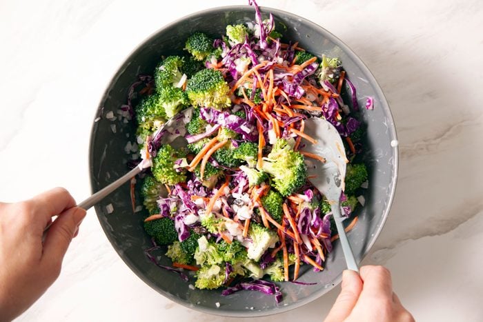 Broccoli Slaw stirring the mix