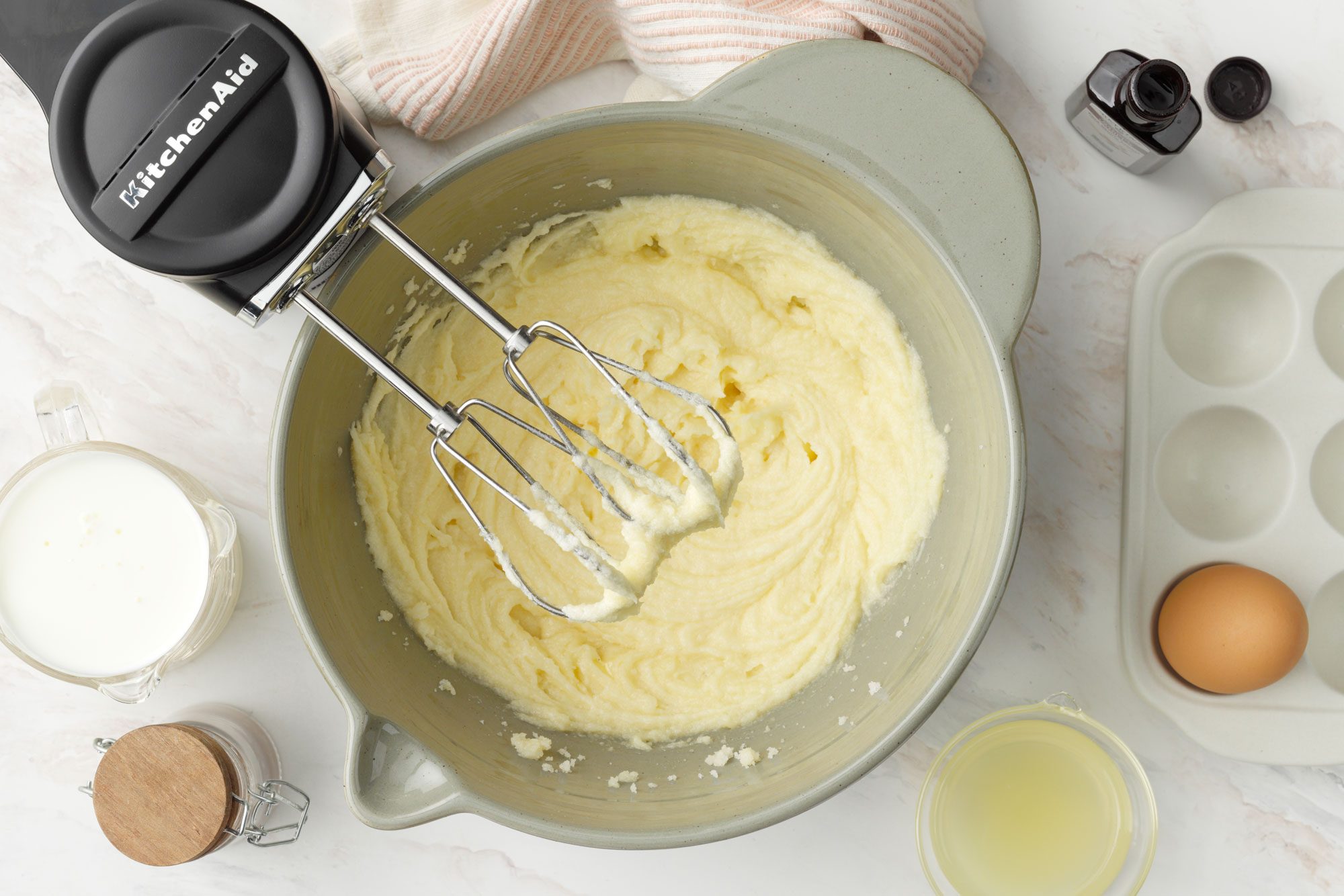 Use hand mixer to butter the cream and sugar