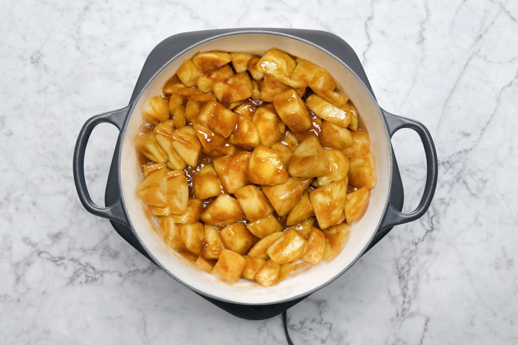 Apple chunks in a large pot