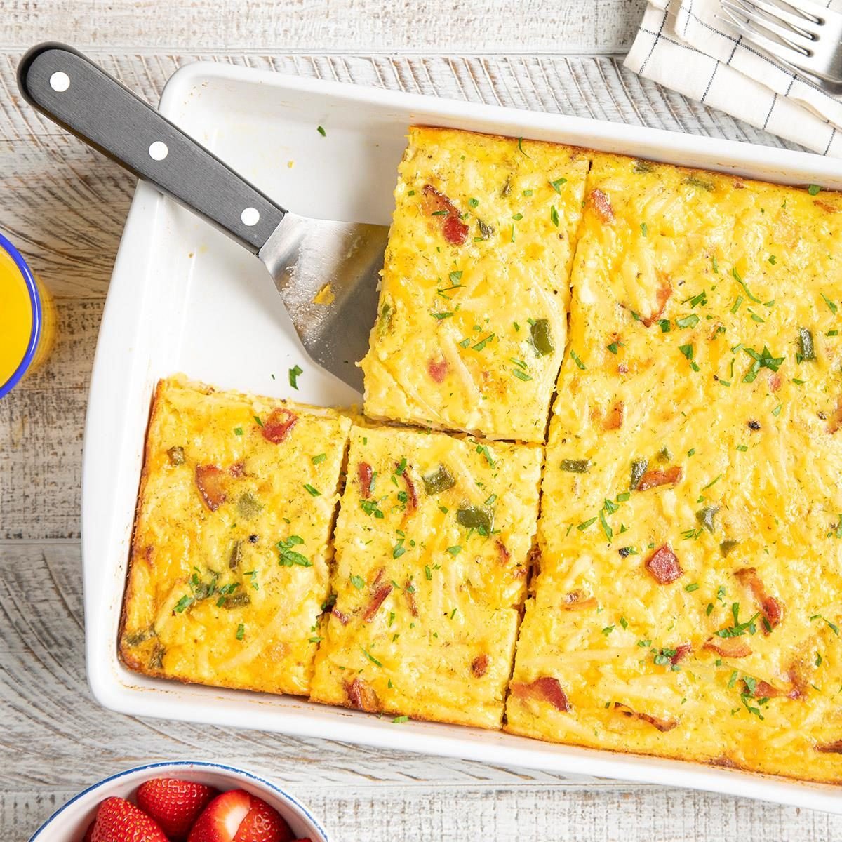 https://www.tasteofhome.com/wp-content/uploads/2018/01/Cheesy-Hash-Brown-Egg-Casserole-with-Bacon_EXPS_FT23_8441_ST_1_28_1.jpg