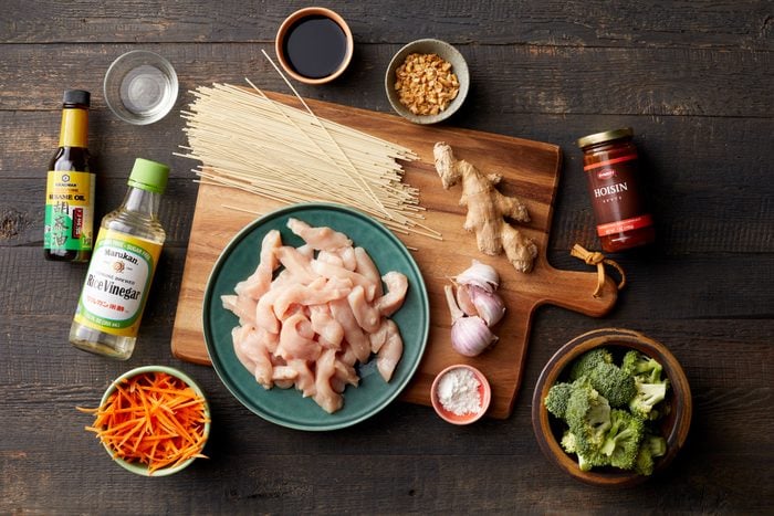 A Table With Chicken Lo Mein Ingredients