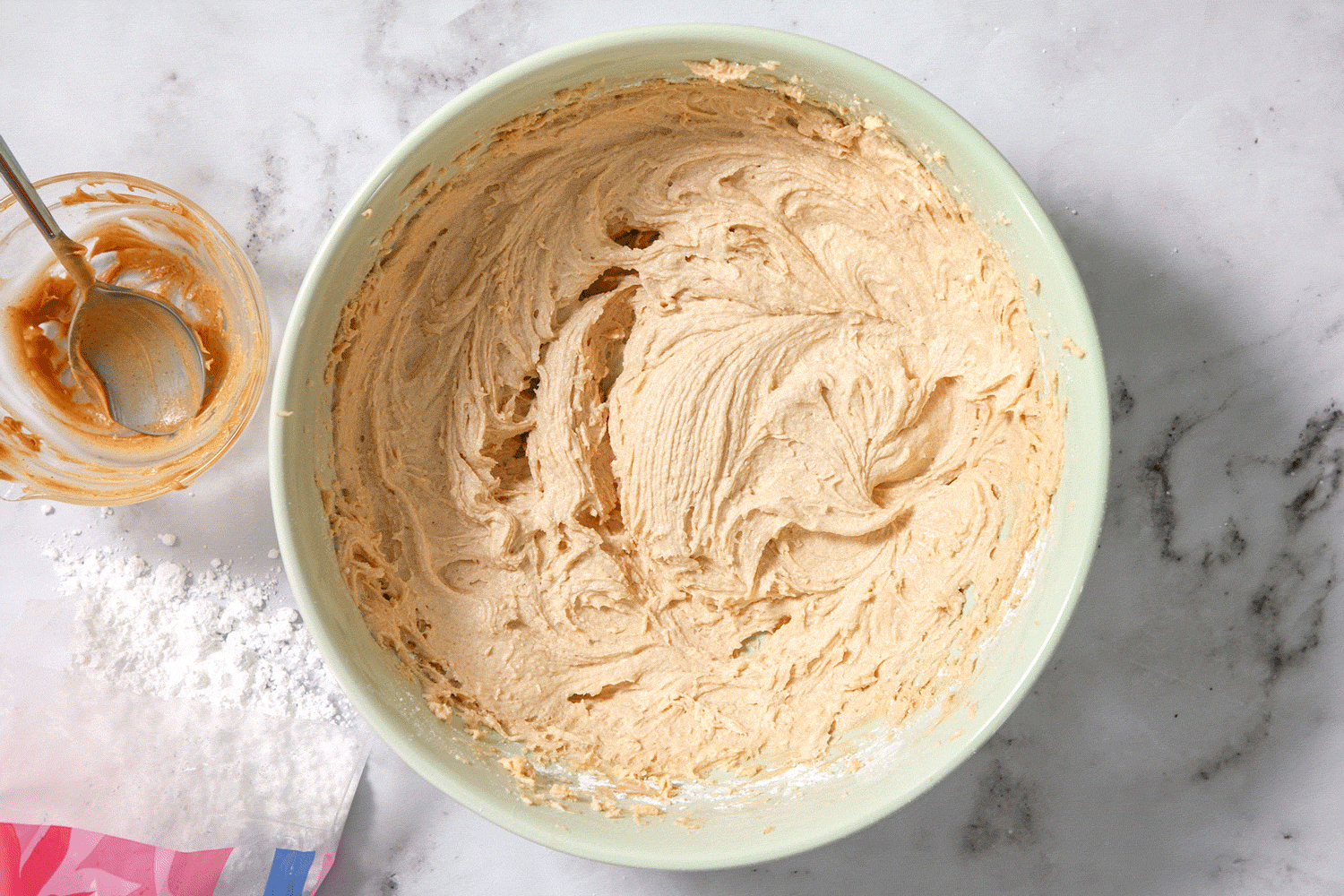 Softened Cream Cheese, Butter And Creamy Peanut Butter Mixture in a Large Bowl