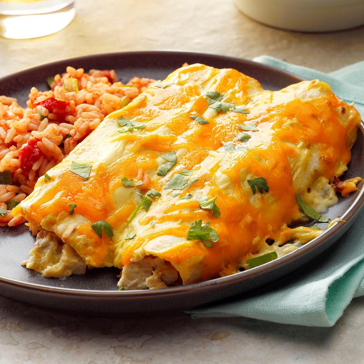 https://www.tasteofhome.com/wp-content/uploads/2018/01/Creamy-Chicken-Enchiladas_EXPS_DIA18_33124_B05_25_2b-6.jpg?fit=700%2C1024