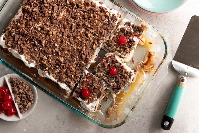 Ice Cream Sandwich Cake with cherries on top