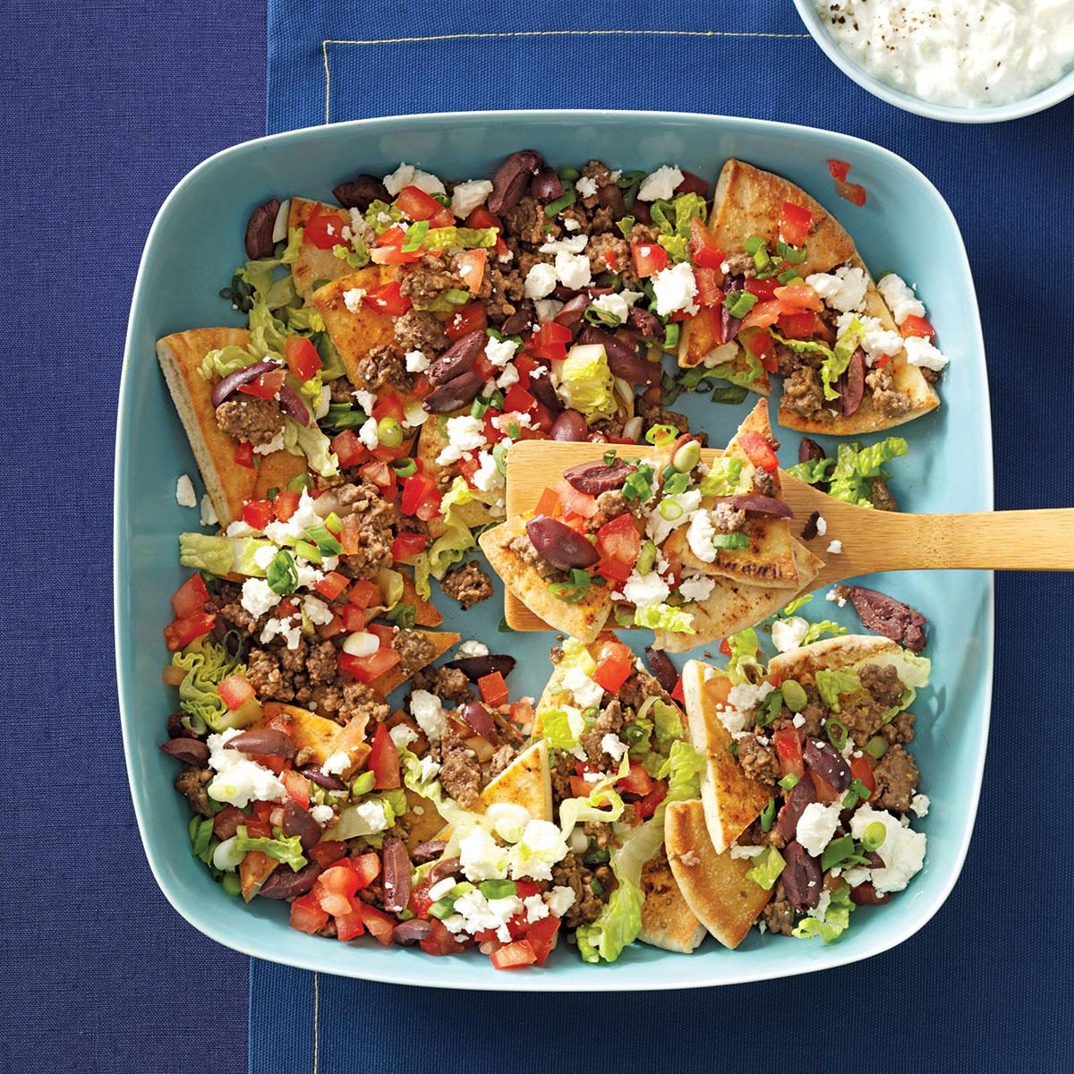 https://www.tasteofhome.com/wp-content/uploads/2018/01/Mediterranean-Nachos_exps98183_TH2236620C06_13_3bC_RMS-2.jpg