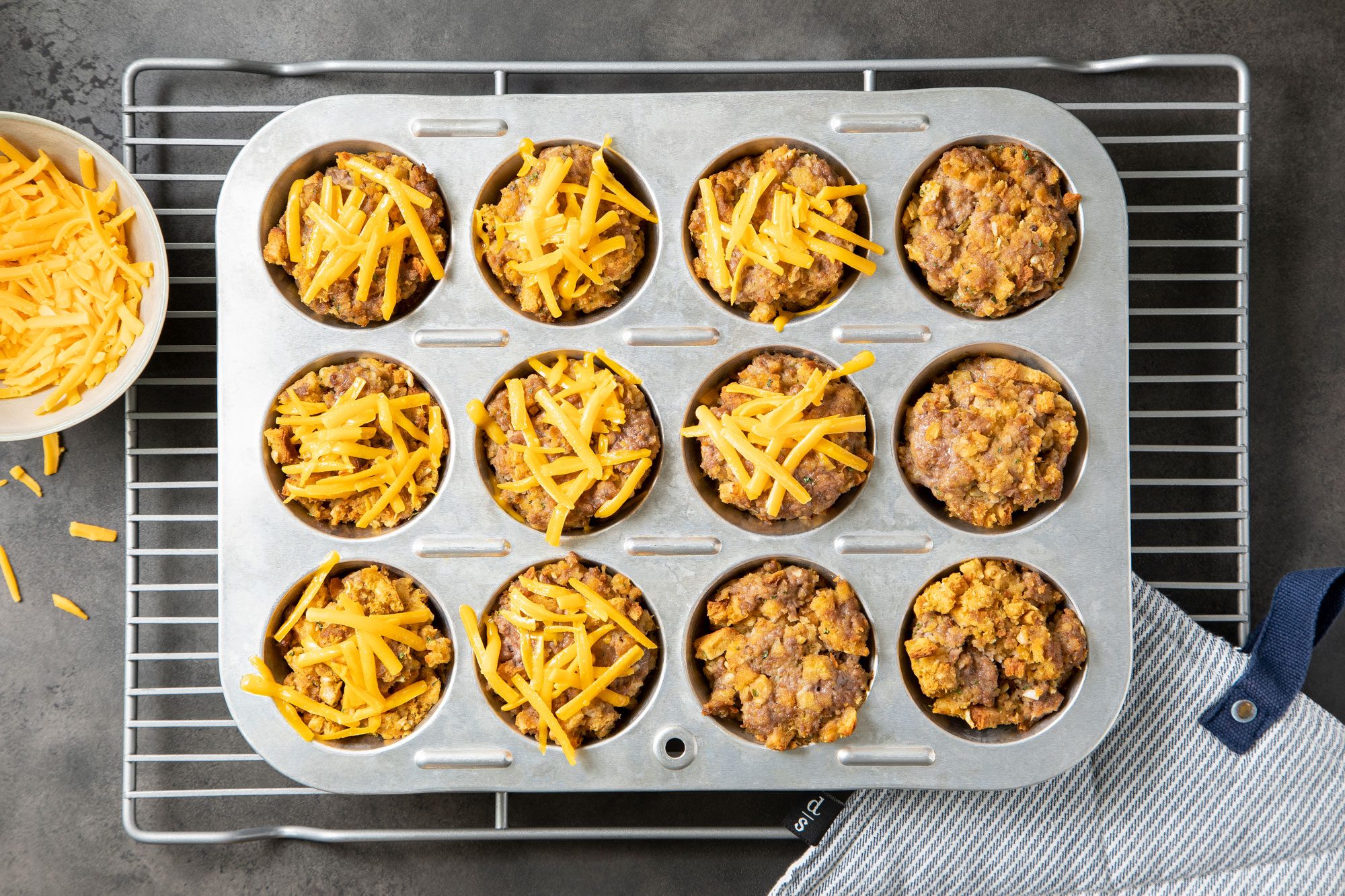 Mini Barbecue Meat Loaves in Muffin Pan Topped with Cheese