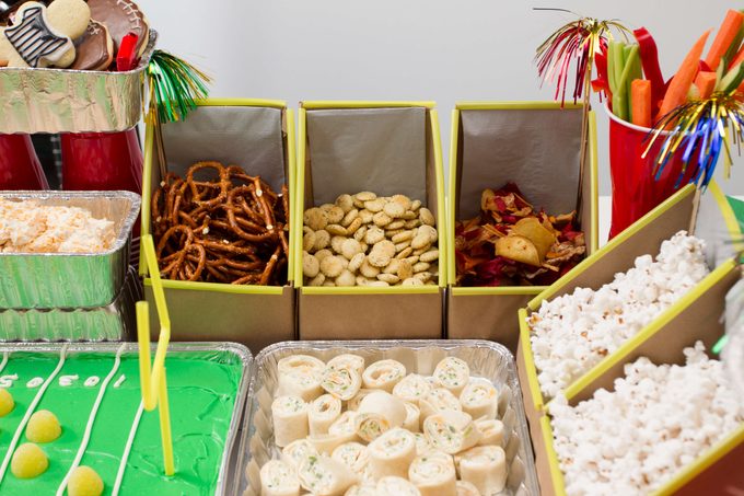 superbowl snack stadium boxes with chips, pretzels, popcorn