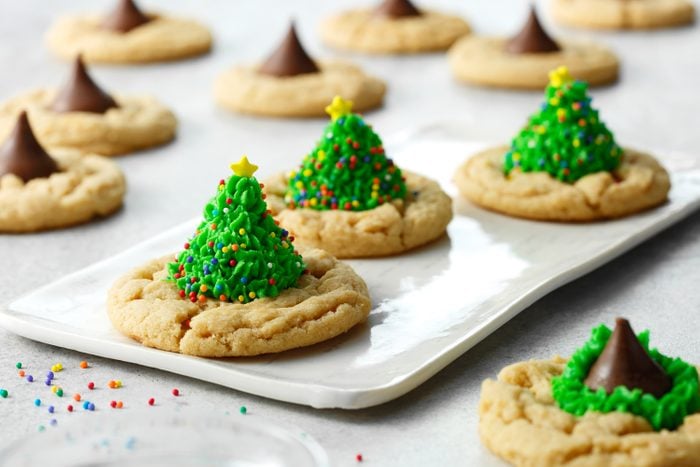Christmas-tree shaped peanut butter cups on top Cookies