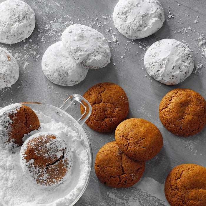 Pfeffernuesse Cookies coated in powder sugar and displayed