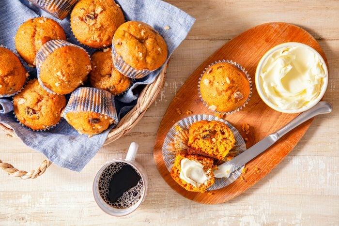 Pumpkin Streusel Muffins in a Basket and some on Wooden Plate