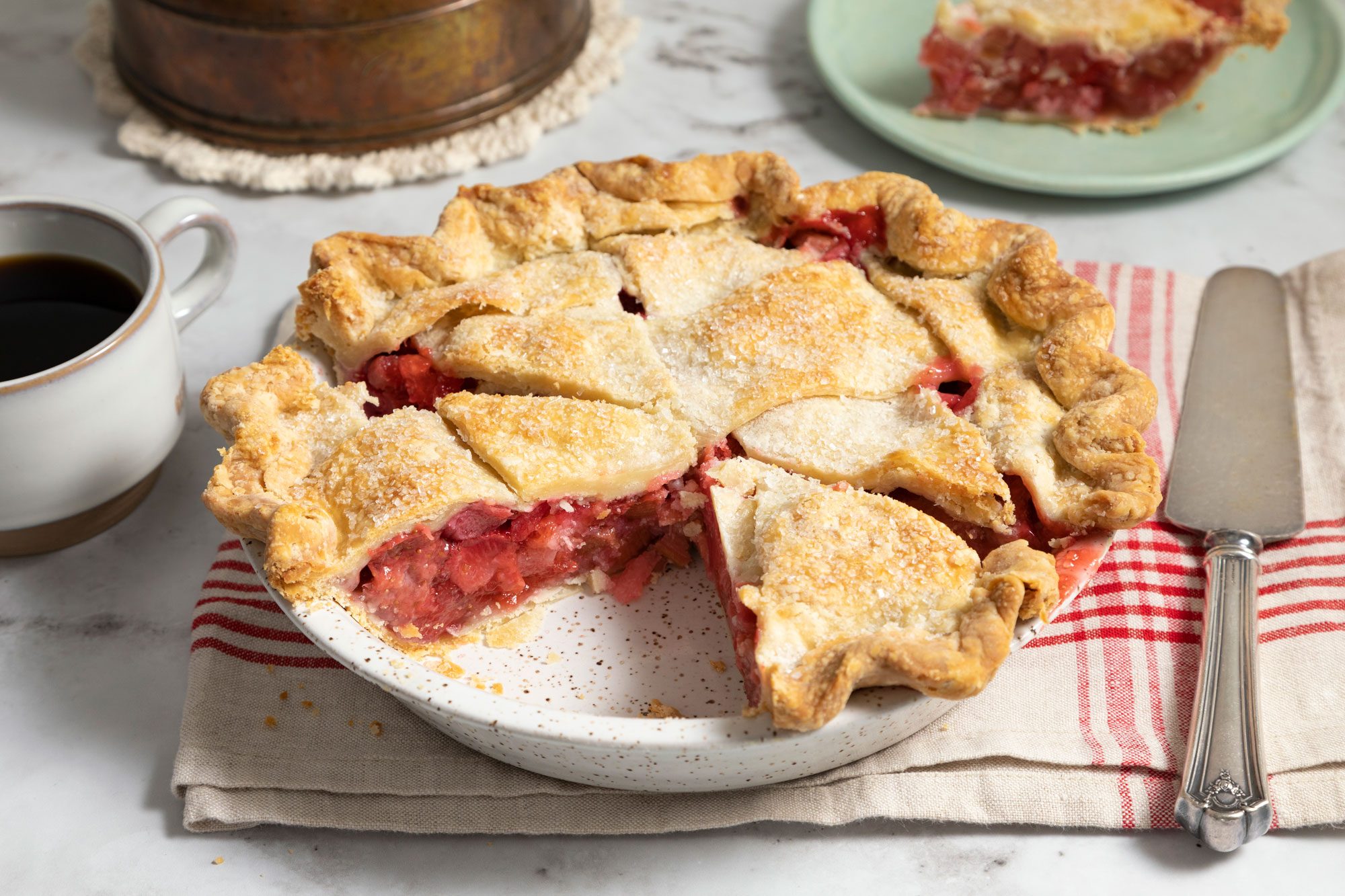 Strawberry Rhubarb Pie sliced and served in plate