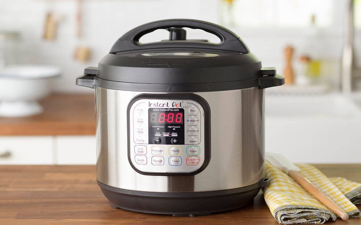 How do I adjust the cooking time and temperature on Instant Pot