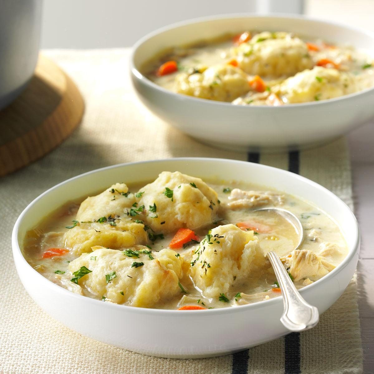 bowl of cooked chicken and dumplings