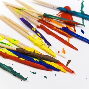 Toothpicks covered in many colors of paint.