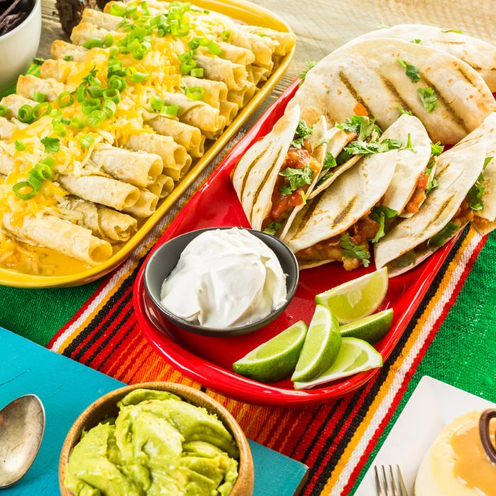 Fiesta party buffet table with traditional Mexican food.; Shutterstock ID 423661501